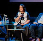 Psychologist Oksana Kryvonogova during the ARQ conference sharing her perspectives on psychotrauma in conflict settings