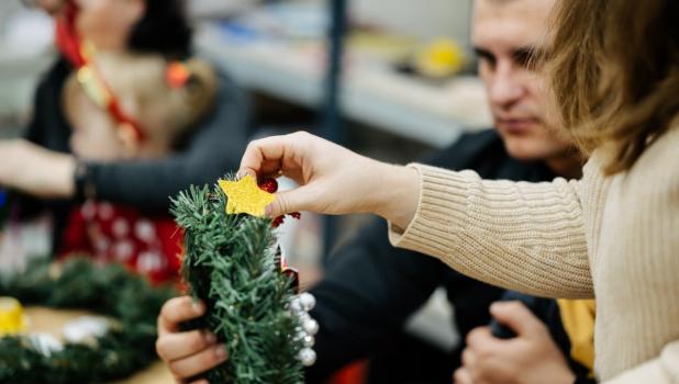 Ukrainian children and their caregivers participating in art therapy