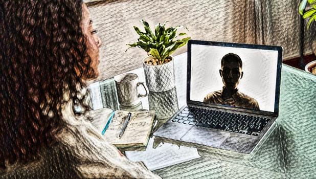 Vrouw voert deepfake gesprek via beeldscherm