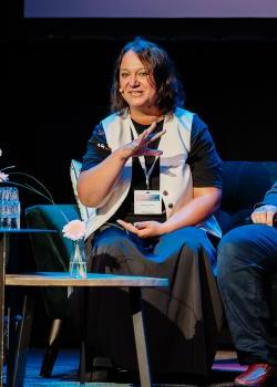 Psychologist Oksana Kryvonogova during the ARQ conference sharing her perspectives on psychotrauma in conflict settings